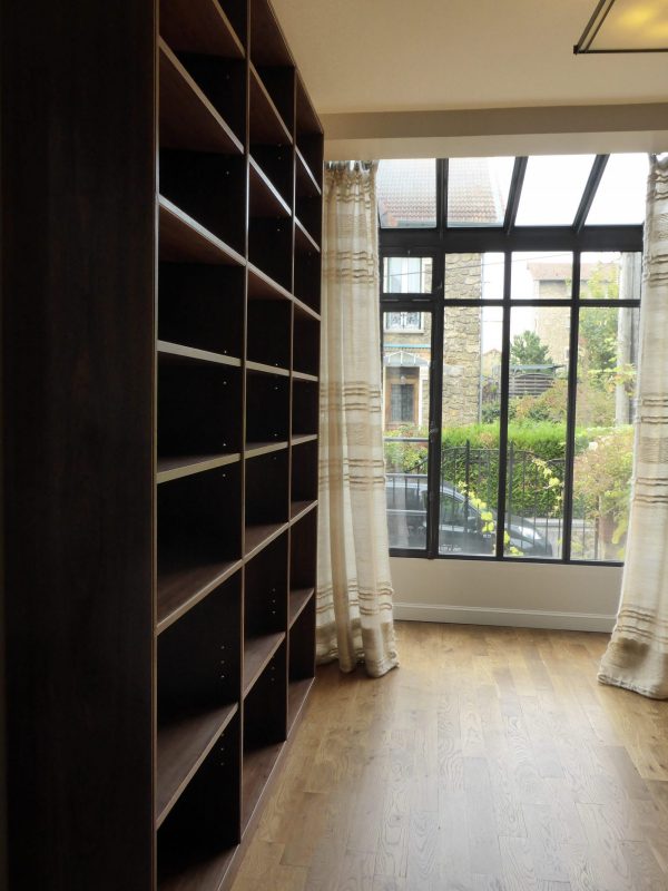 Bespoke-book-shelving-in-walnut-and-sycamore